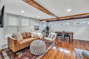 Cottage living room, new hardwood floors, boho furniture