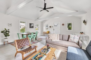 Open living / dining room / entrance; window treatments have been added!