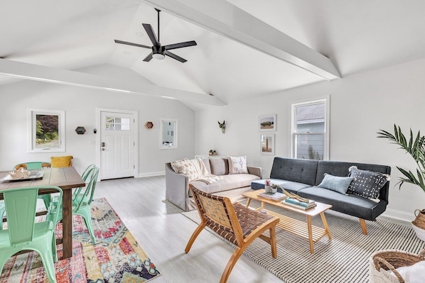 Relax in the open living / dining room, window treatments have been added!