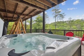 Soak in the hot tub with a beautiful North Georgia Mountain View