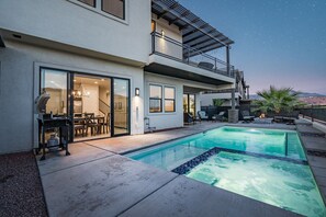 Luxurious backyard with pool, BBQ and lounging area