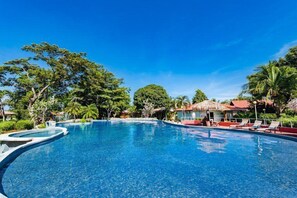 "Seas the day" with poolside bliss - Let your worries wash away in the crystal-clear waters of our tropical haven!