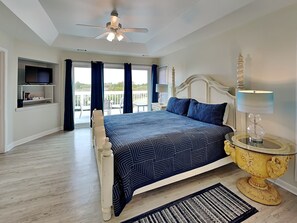 Tybee Stars -Bedroom 1 with a king-sized bed and access to large deck