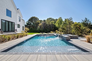Heated saltwater pool and spa with bluestone surround