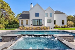 Heated saltwater pool and spa with bluestone surround