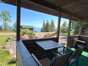 People love this little front porch with a dining table for 2. Plus 2 sling back chairs