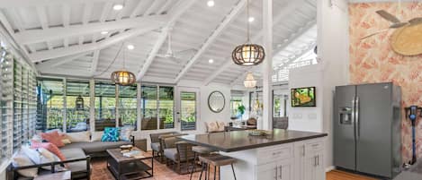 Vaulted ceilings and endless windows create an open space with tropical views!