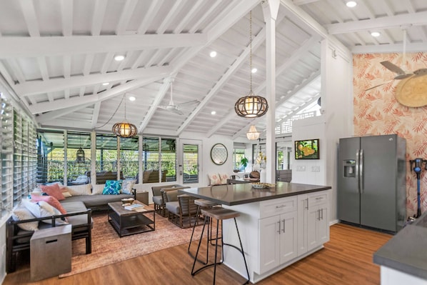 Vaulted ceilings and endless windows create an open space with tropical views!