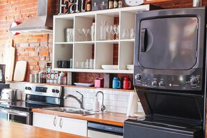 This beautiful kitchen has everything you'll need to enjoy your stay - even coffee and tea! With an oven, stovetop, microwave, coffee maker and dishwasher, you have everything you need at your fingertips. 