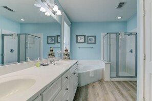 Master's bathroom with a large bathtub