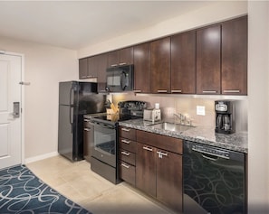 Unit may vary in layout, view, floor, and decor.