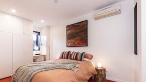 Comfortable queensize bed with reverse cycle A/C in bedroom