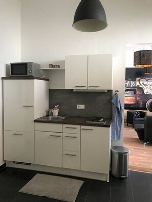 Step into the kitchen, where Arbio Designers have created a culinary haven, blending functionality and style seamlessly.