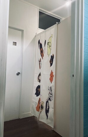 In front of the washroom