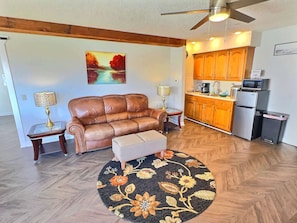 Living Room - Kitchenette with coffee, Microwave, Fridge, and Ice Machine
