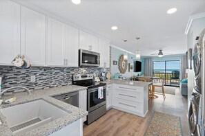 The ocean is in clear view all the way in the kitchen!