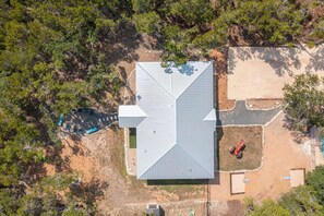 Exterior Oasis: Nestled among lush trees, enjoy serene outdoor spaces and effortless access to nature!