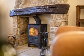 Ground floor: The wood burning stove in the sitting room is perfect for the cooler months