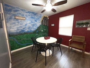 Dining Area with Custom Mural