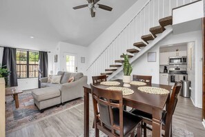 Bask in the radiant glow of abundant sunlight as the vaulted space in the living area creates an airy haven filled with natural light.