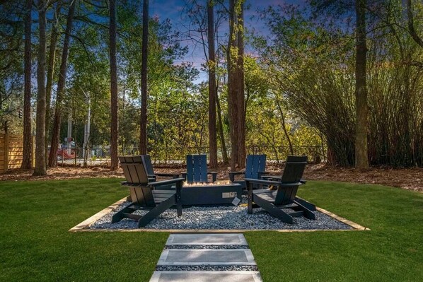 Sit back and relax in some of the most comfortable outdoor chairs ever!  Enjoy a glass of wine or IPA while unwinding around your gas powered fire pit.  