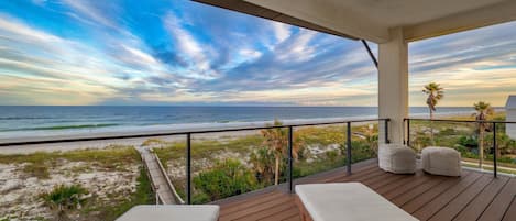 Private oceanfront balcony off primary bedroom