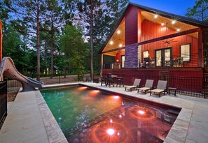 The glow-up is real. Check out the new pool with vibrant lights and cozy loungers. Perfect for day or night dips!