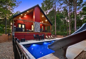 Lounge in luxury by our freshly installed pool — complete with a slide for extra splash-worthy fun.