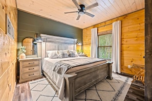 Spacious Master Bedroom: Revel in the opulence of our spacious master bedroom with plush bedding. Local Fact: Pigeon Forge is named after an iron forge built along the Little Pigeon River in the early 19th century.