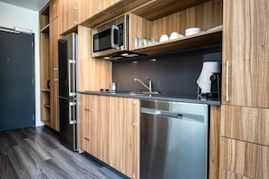 Cook your favorite meals in a kitchen bathed in natural light that enhance the culinary experience.