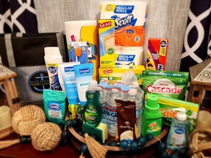 Welcome Bag with starter quantities of household items. Quantities and brands not guaranteed.