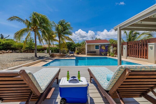 Unwind and soak up the sun on our inviting poolside loungers.