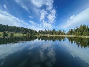 Clouds reflecting on the calm and cool Leland Meadows Lake.  Are you ready to go for a paddle or swim? 