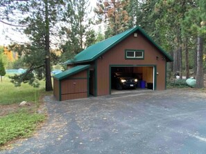 Oversized 2+ car garage is large enough to back in a truck and trailer. 