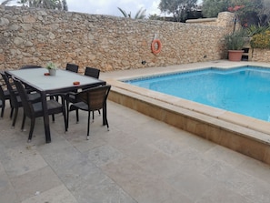 Large private sunny pool with dining area