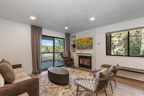 Vacation Rentals in Park City at Red Pine Y2: Living room area with fireplace and balcony