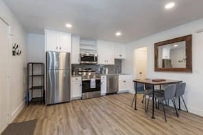 Cozy dining setup for four, perfect for family meals.