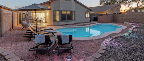 Welcome to WILD CARD our 3 BR, 2 BA, single story, E Mesa home with a heated pool and covered patio with grill.