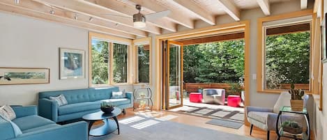 Beautiful living room with french doors which open to a garden.