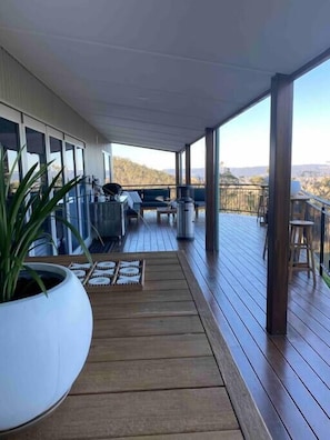 The beautiful hardwood deck with plenty of our door games to entertain.