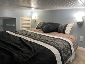 Queen bed in loft