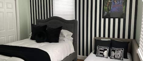 Tim Burton Movie inspired bedroom!!
1 queen bed, 1 twin bed.  