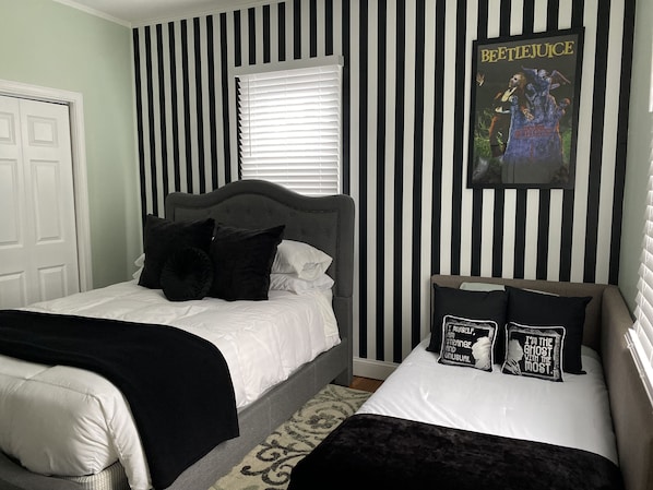 Tim Burton Movie inspired bedroom!!
1 queen bed, 1 twin bed.  