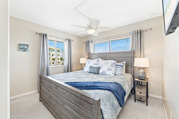 Master bedroom with King sized bed and private bathroom