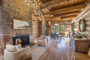 Cozy sitting area next to the double sided gas fireplace