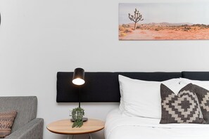 Relax and recharge in this inviting bed, complete with plush pillows.