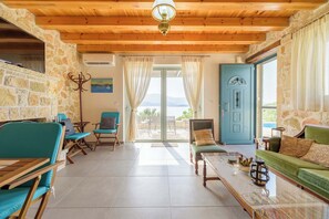 Spacious Traditional Living Room with Stone Details



