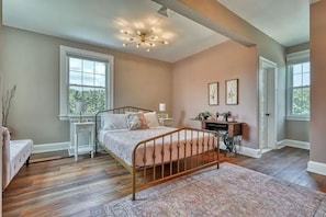 Bedroom 1 with a queen bed and beautiful decor