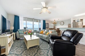 🛋️ "Relax in Style. The living area features two comfortable leather couches, a recliner, and a large smart TV—perfect for movie nights, cozy conversations, or simply unwinding after a day at