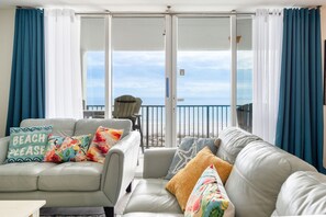 🛋️ "Relax in Style. The living area features two comfortable leather couches, a recliner, and a large smart TV—perfect for movie nights, cozy conversations, or simply unwinding after a day at